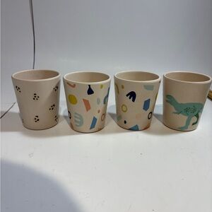 Set a four children’s kitchen colorful play cups One Cracked